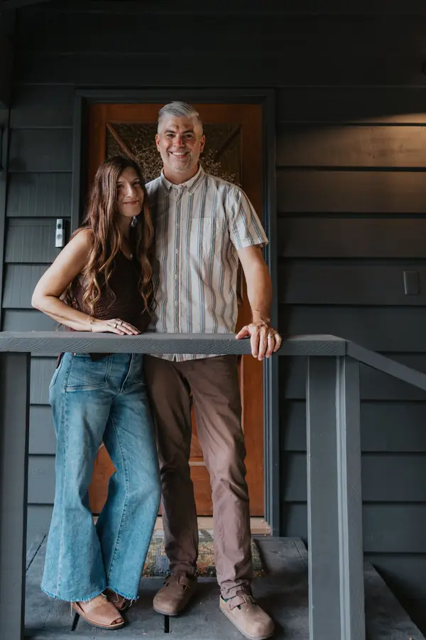 Jamin and Kristin Goggin on their front porch